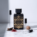 Decant de Lattafa Bade'e Al Oud Oud for Glory en 3, 5 y 10 ml junto a la botella original de Lattafa