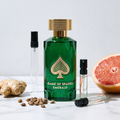 Decant de Jo Milano Paris Game of Spades Emerald en 3, 5 y 10 ml junto a la botella verde esmeralda original de Jo Milano Paris
