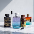 Pack Los 4 Árabes: Bade'e Al Oud Oud For Glory, Hawas Ice, Odyssey Dubai Chocolat y Tropical Vibe, con los tres atomizadores