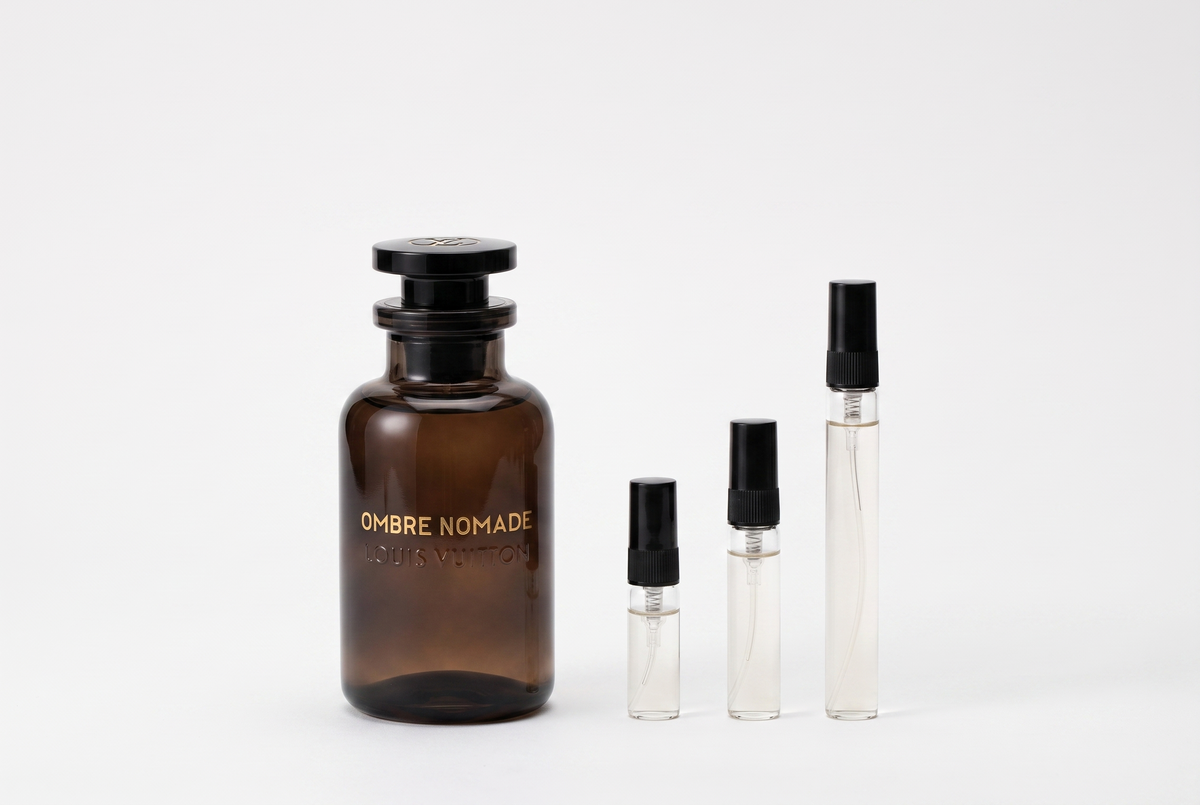 Botella original de Louis Vuitton Ombre Nomade junto a decants de 3, 5 y 10 ml